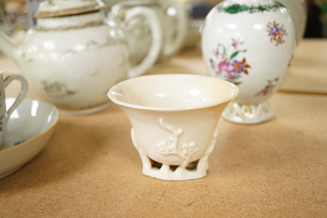 18th century Chinese porcelain tea wares - a grisaille decorated teapot and cover - 13cm high, a famille rose tea caddy, cup and saucer and a Kangxi blanc de chine libation cup